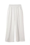 Szerokie spodnie dziewczęce z weluru w kolorze białym